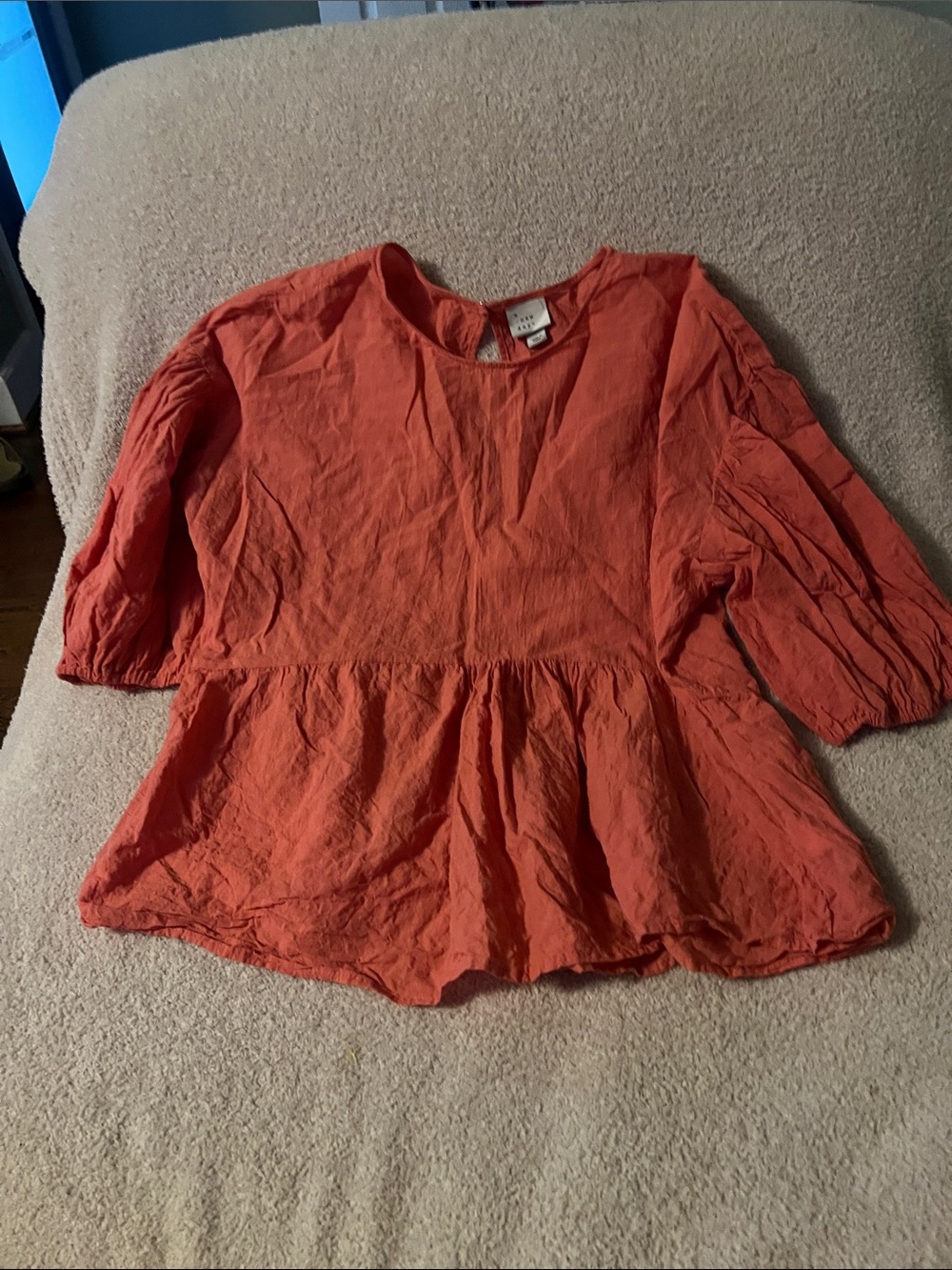Women's Peplum Blouse in Peachy Orange